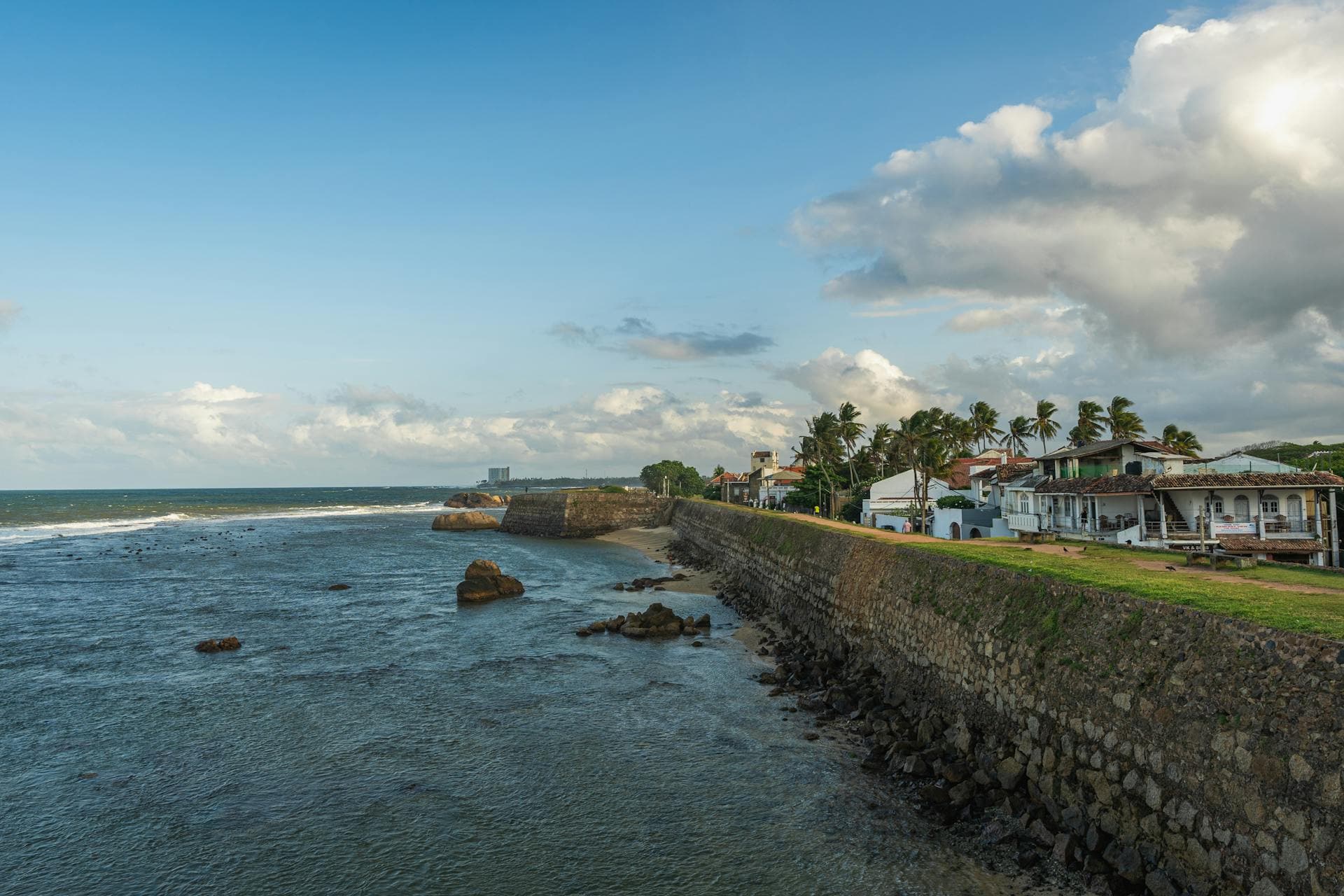Galle Fort ramparts beside the Sri Lankan coast at sunset