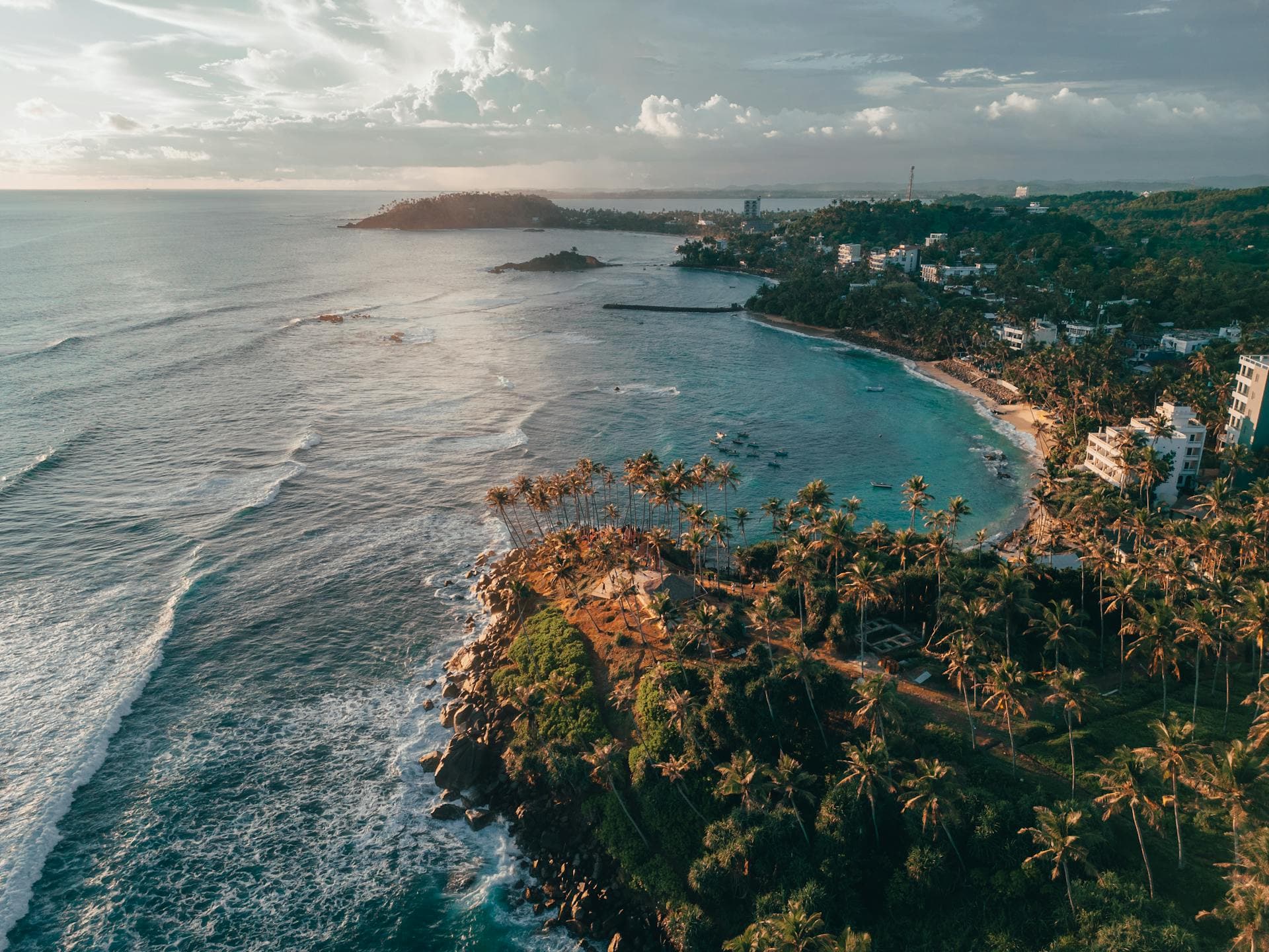 Palm-fringed Sri Lankan coastline from above